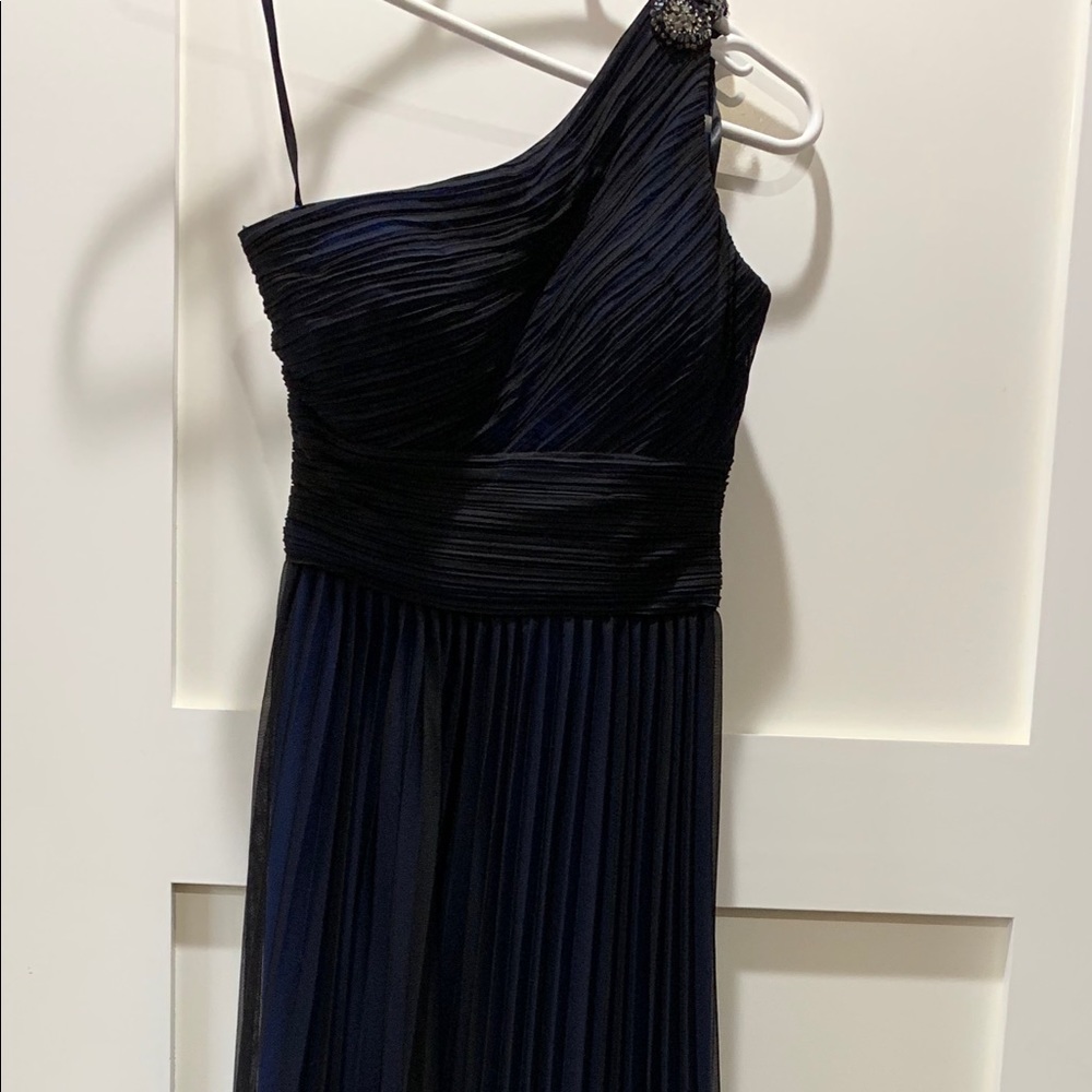 Floor length, one strap dress.